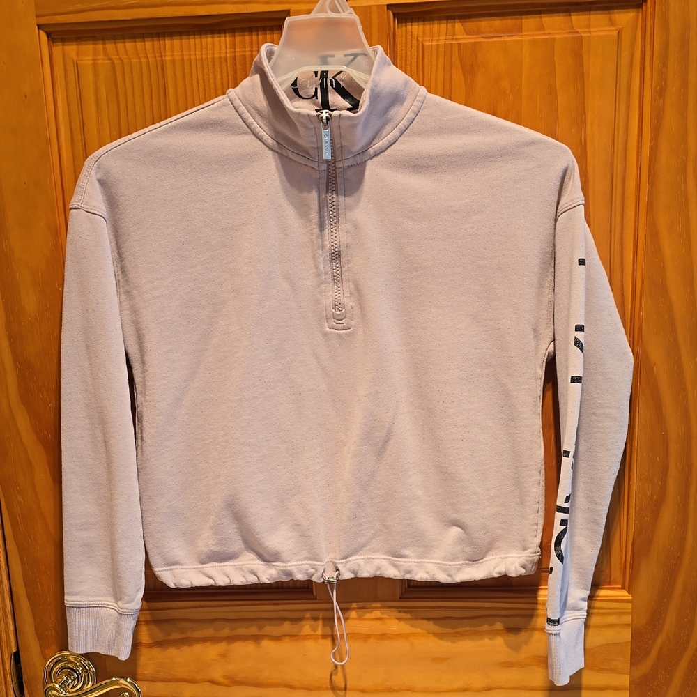 Calvin Klien Cropped Half-Zip Pullover in Light Peach.